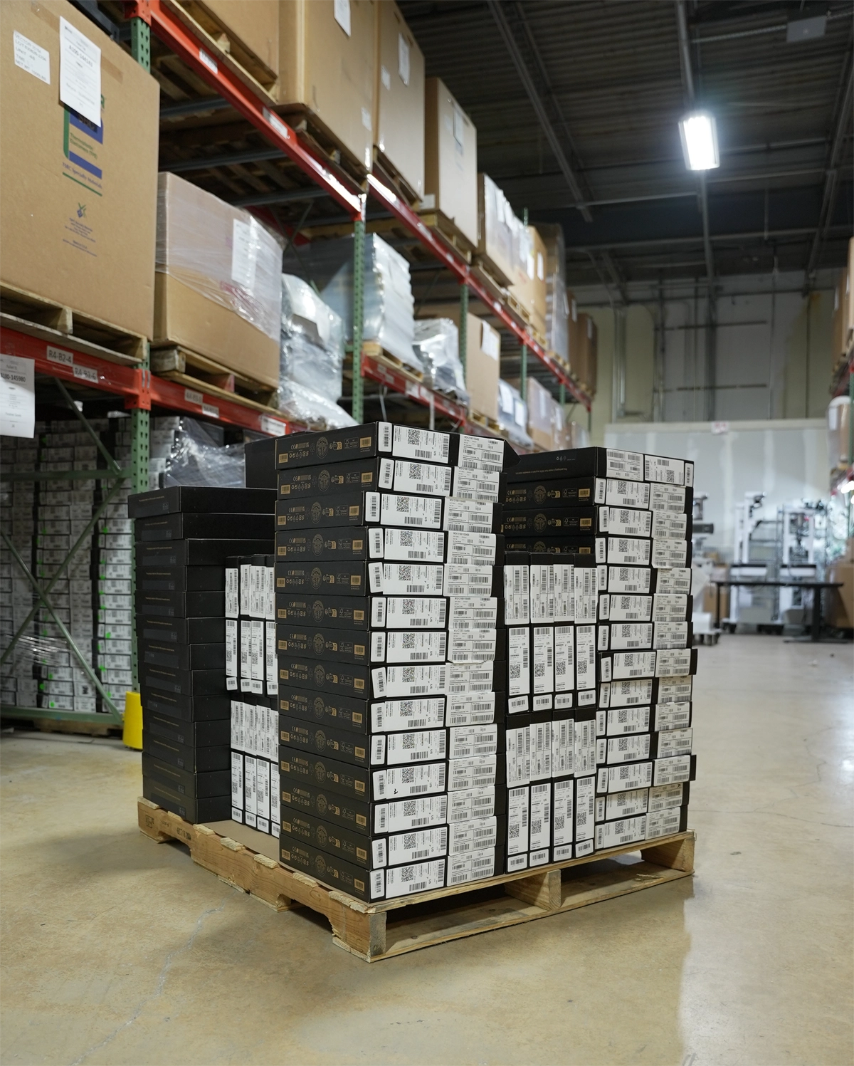 Brand new Dell Latitude 7350 stacked on a pallet in the RefurbConnect warehouse